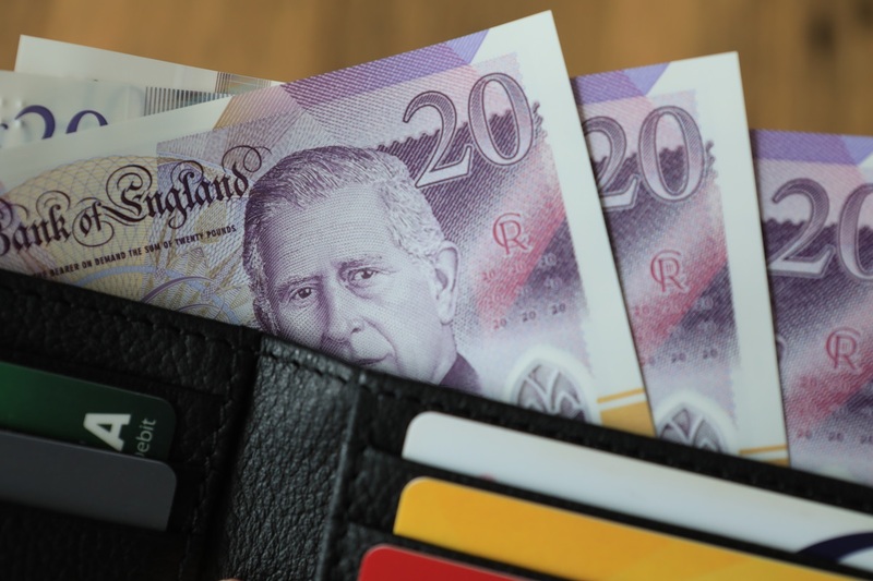 Why are more Britons returning to using cash?